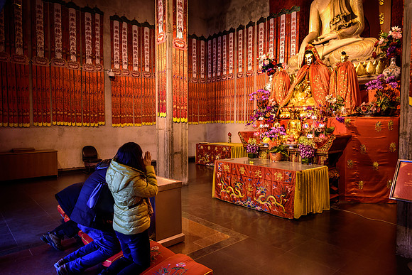 Prayer in Temple, China